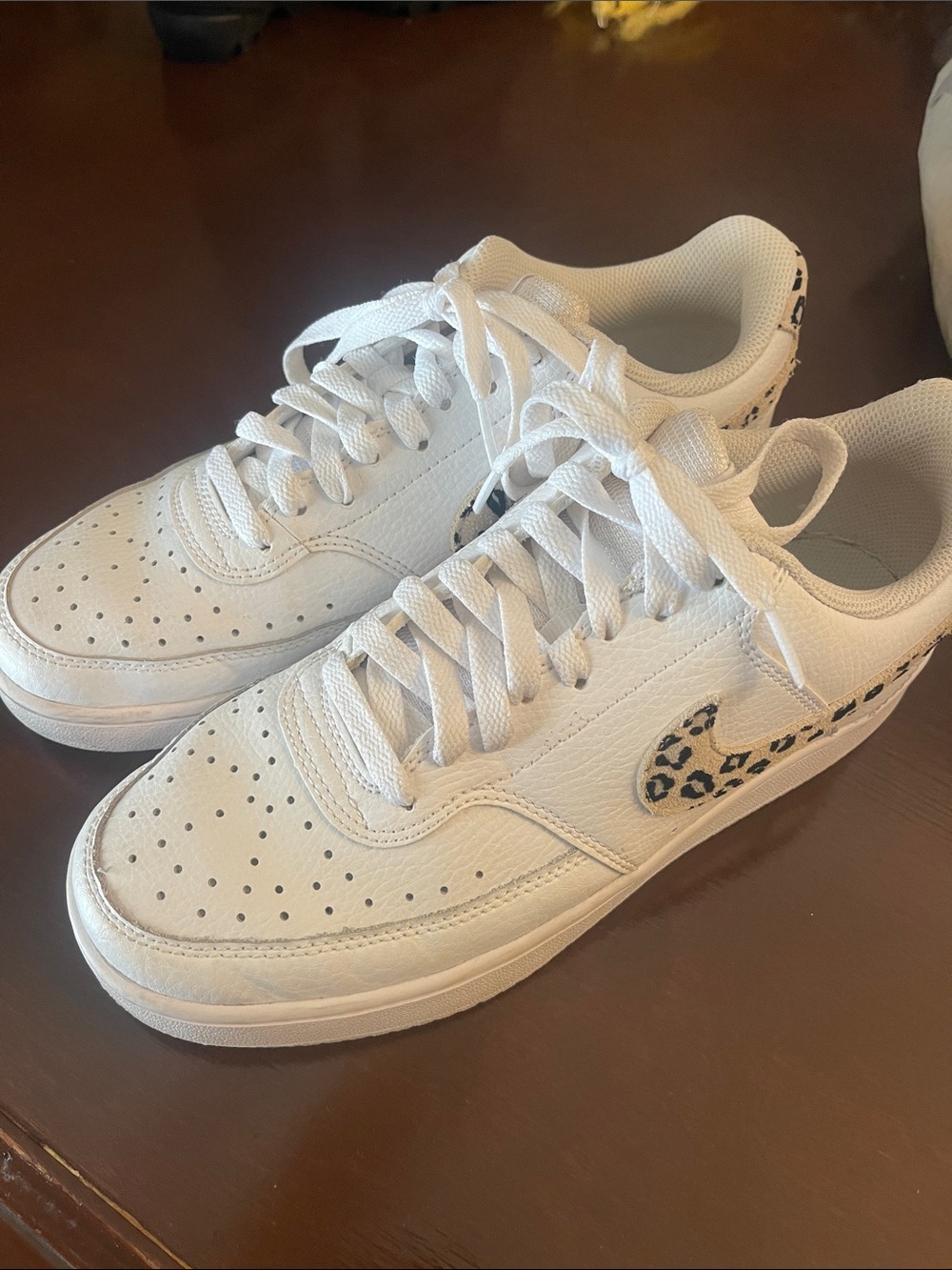 Nike White Low-Top Sneakers with Leopard-Print Swoosh